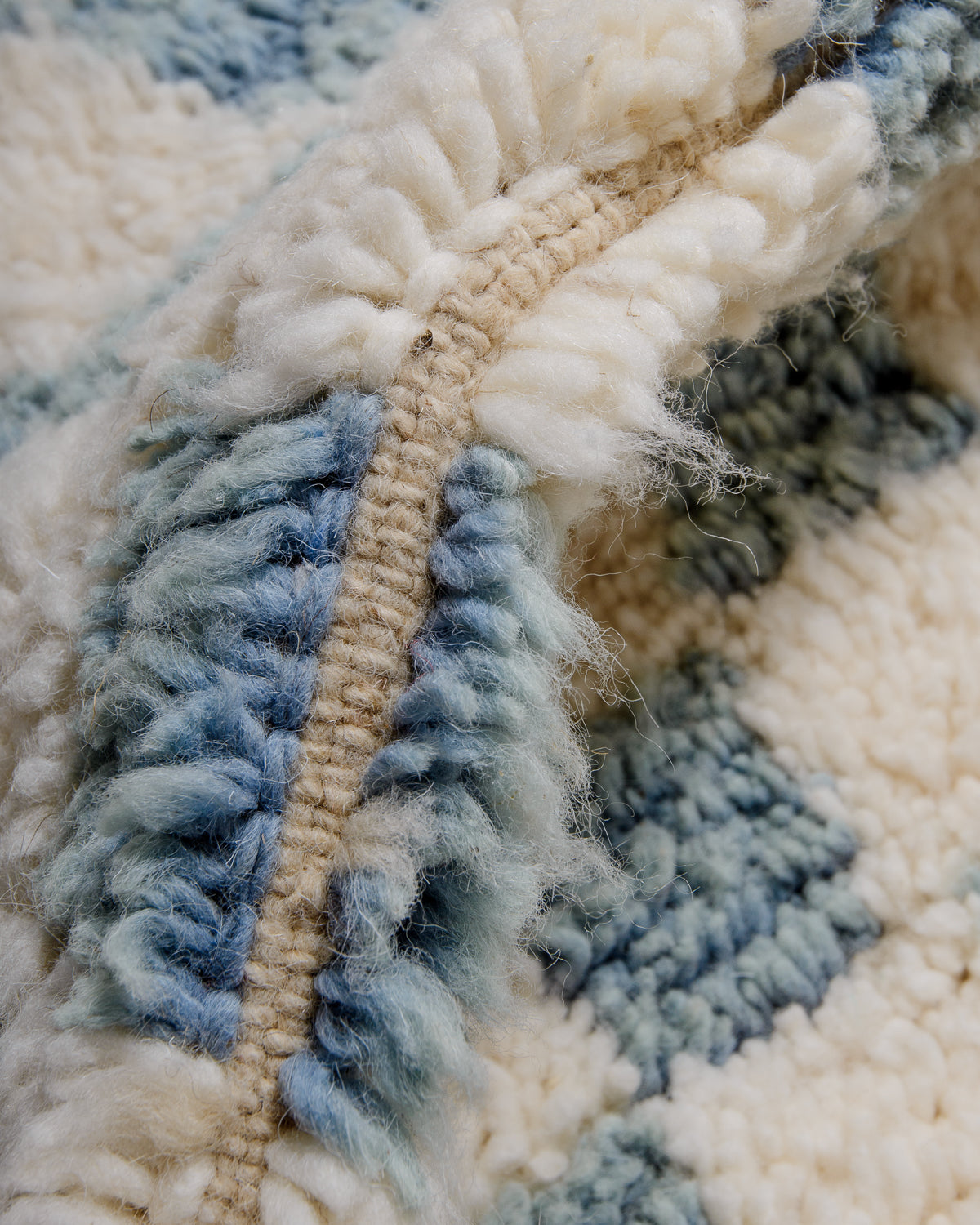Modern, designer, handcrafted Berber rug from Morocco. Beniourain carpet with beautiful colours and patterns and fluffy wool texture.
